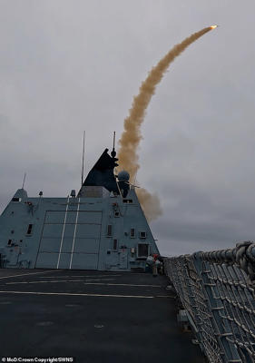 HMS Defender of Royal Navy successfully destroys jet drone in a £1bn test, considered the 'world's largest' demonstration of naval defences.